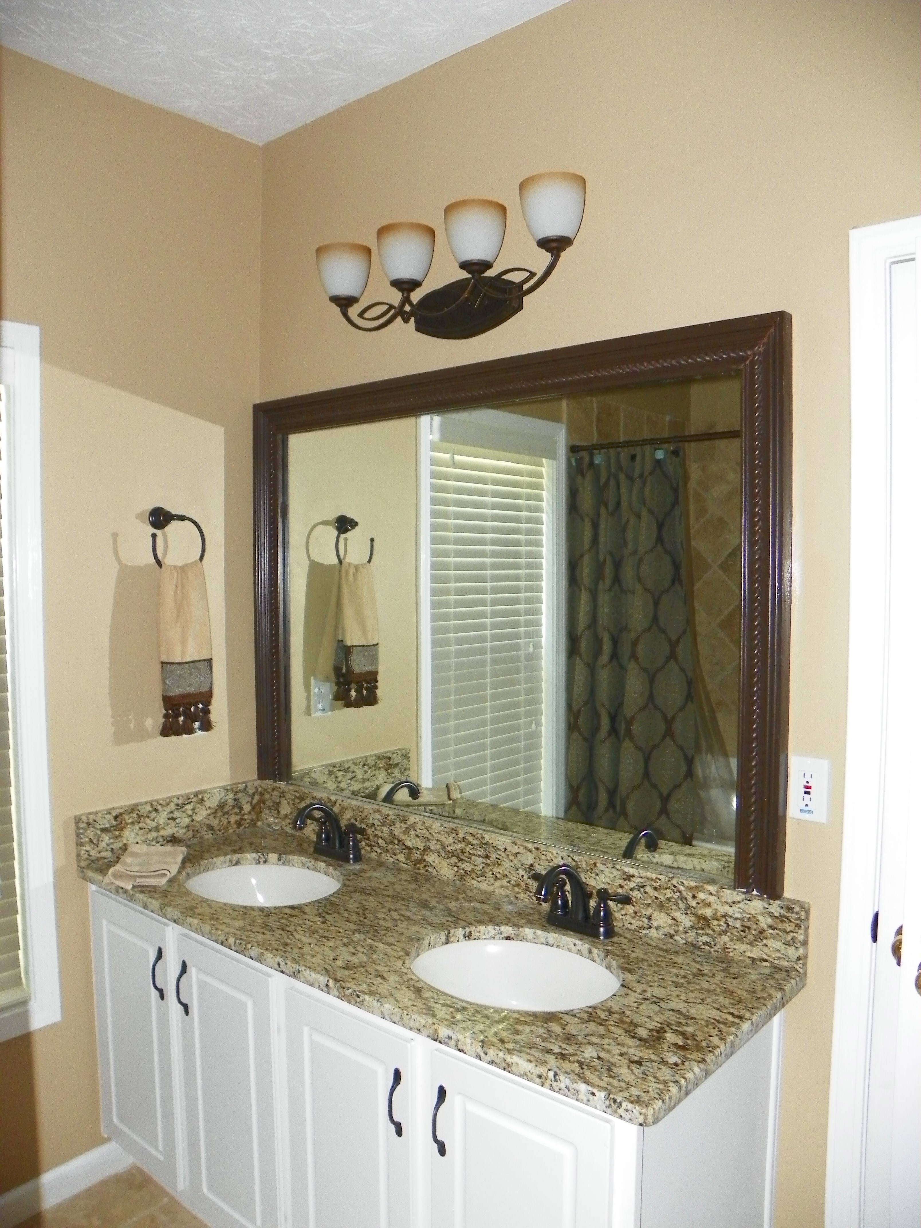 Bathroom renovation with granite counter tops, ORB fixtures and more.