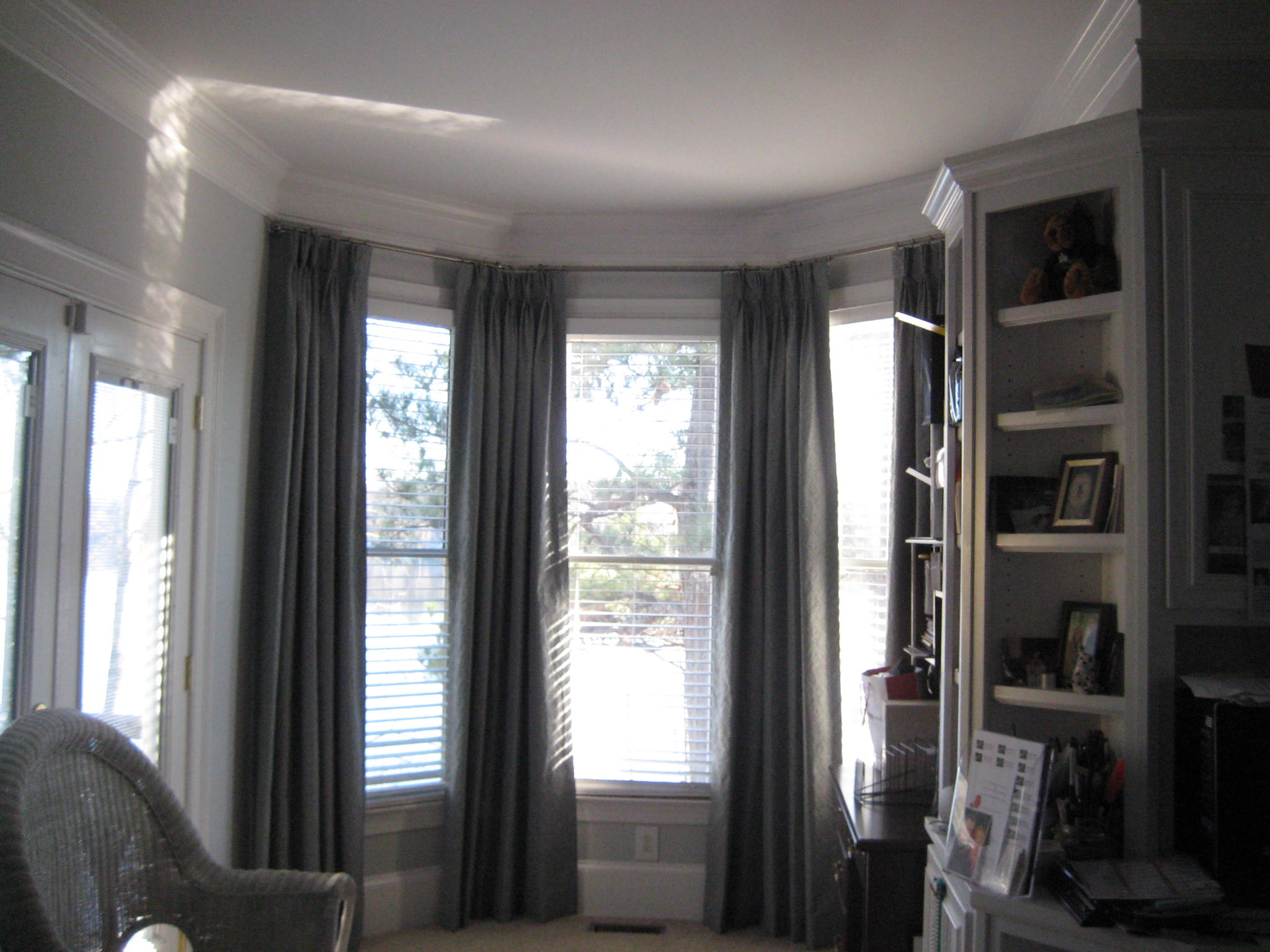 Bedroom Make over. Window treatments and blinds help insulate the home for the winter and summer.