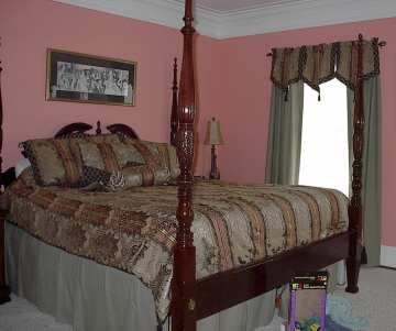 Bedroom - Coordinated bedding and window treatments.