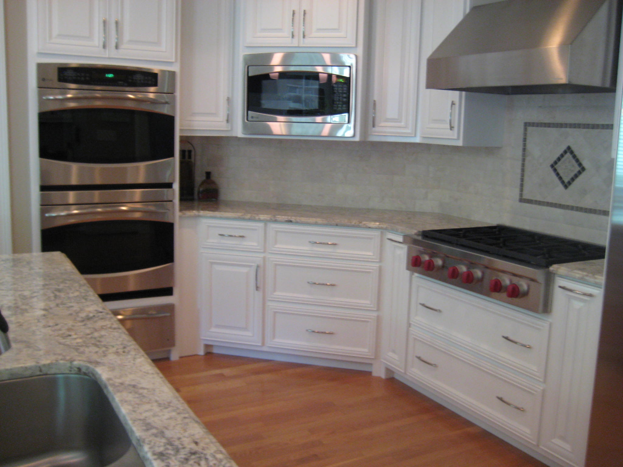 Kitchen renovation with new custom cabinets, appliances, granite and more.