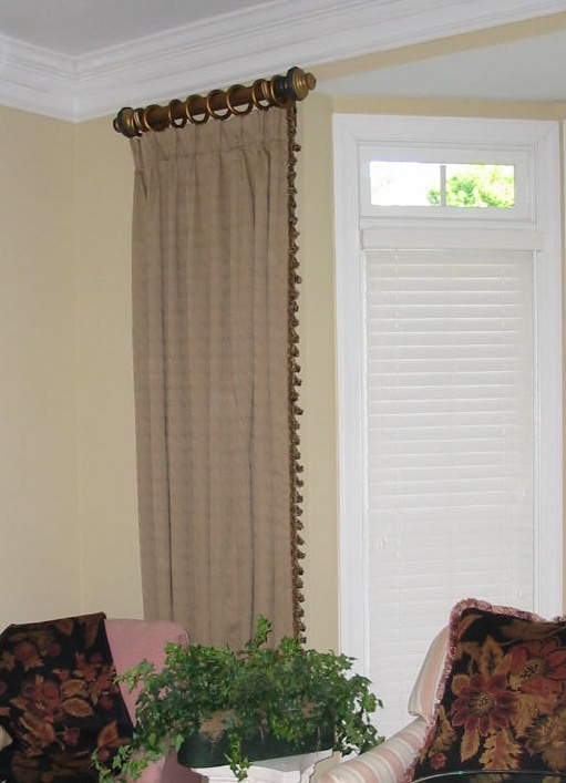Living Room - Pleated Panles w/trim using short wooden pole.