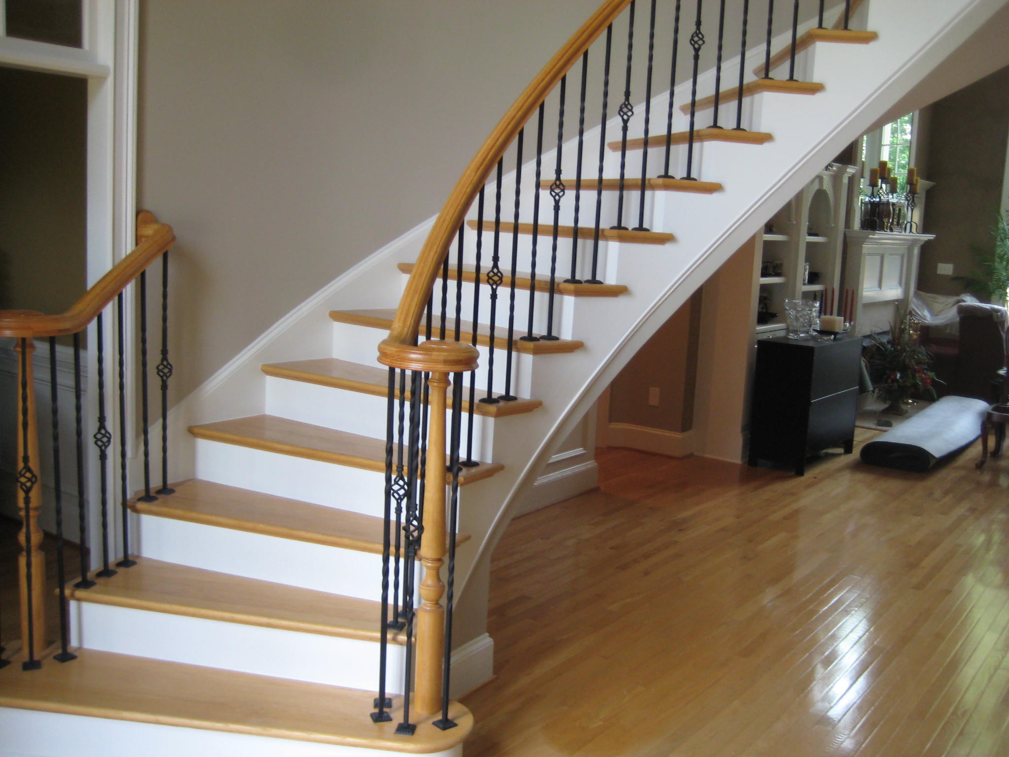 Iron Balusters enhances elegant staircase.