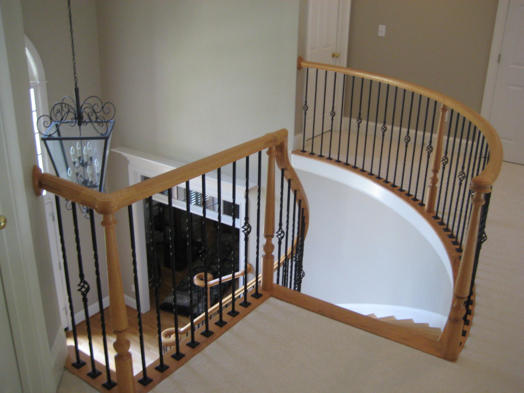 Iron Balusters enhances this elegant staircase.